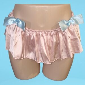 Pink ruffle, skirted thong panty with blue bowtie accents
